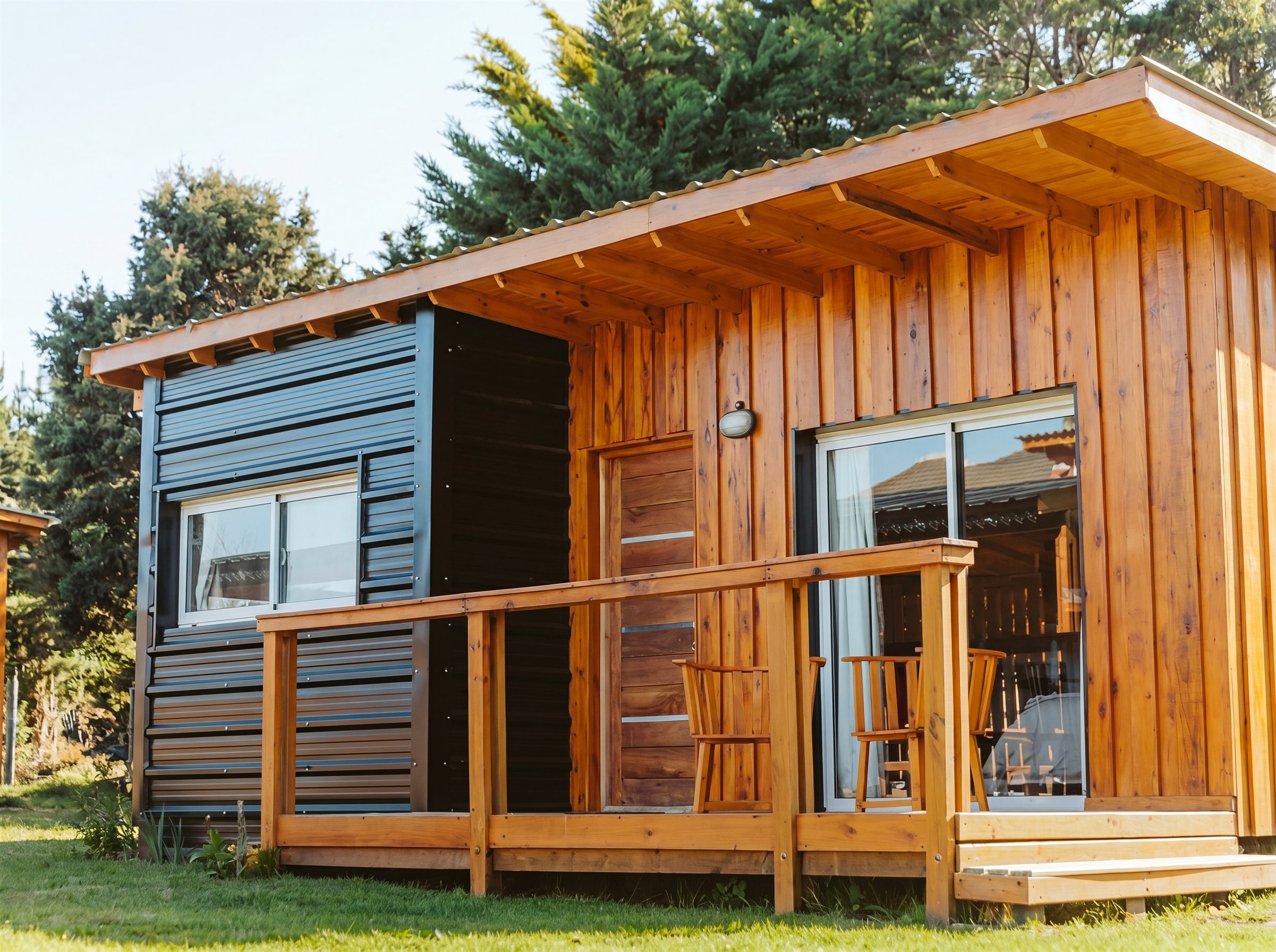 Cabaña de madera con porche construida por Victech